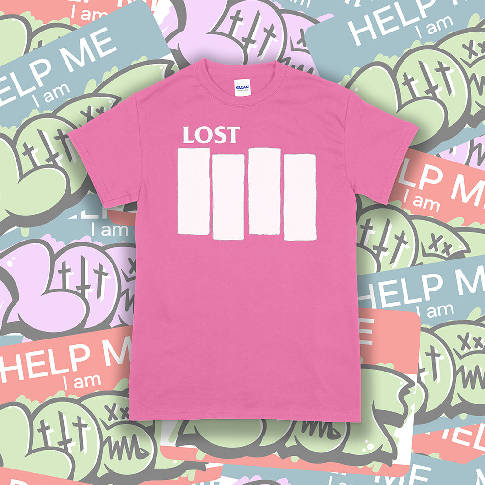 The Lost Flag t-shirt. The iconic bold logo is screen printed in white ink on an azalea pink cotton shirt. A collection of colorful graffiti stickers make up the background.