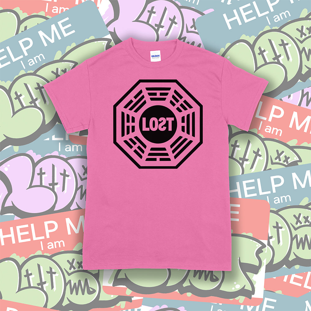 The Lost Initiative t-shirt by Lost Streetwear. The bold black logo is screen printed on an azalea pink shirt. A wall of brightly colored graffiti stickers make up the background.