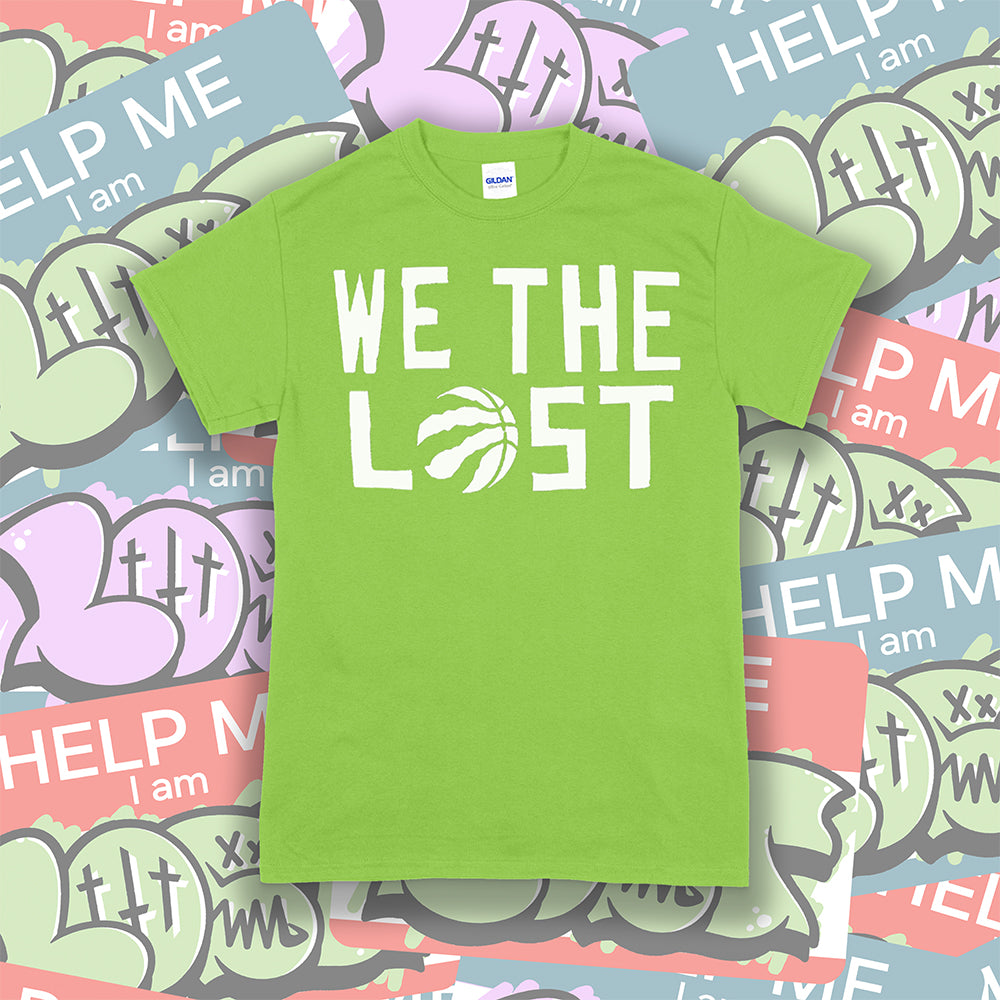 The We The Lost t-shirt. Bold white lettering and raptor claw design screen printed onto a lime green colored shirt. A collection of brightly colored graffiti stickers makes up the background.